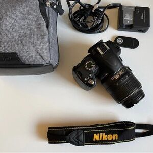 Nikon D3000 Black Digital Camera with Lens and Strap